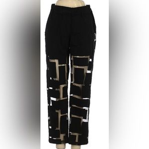 Modern geometric pants with sheer cutouts